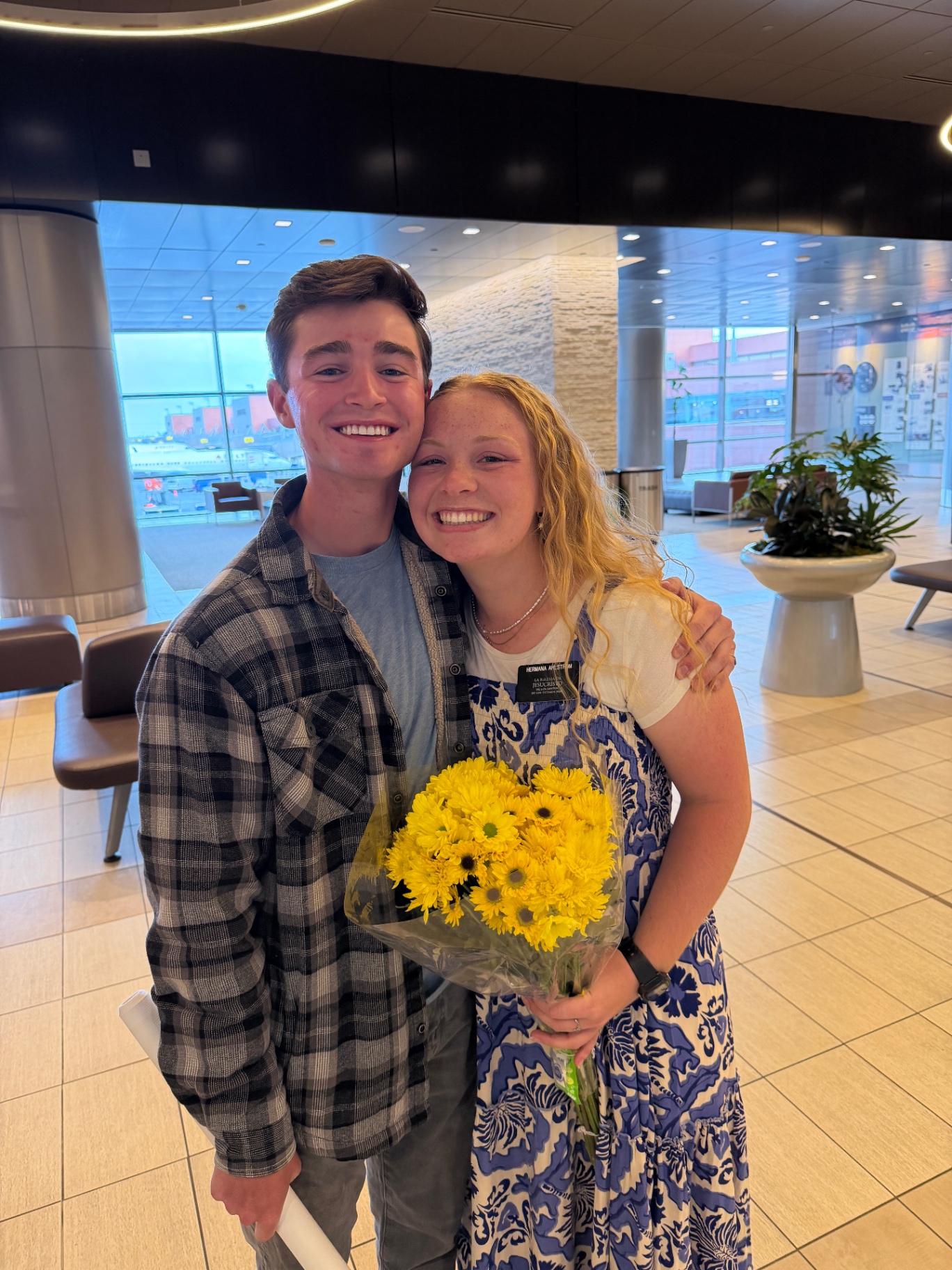 Reunited at the airport after Grayce's mission